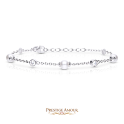 Diamonfire Alternating Shell Pearl and Zirconia Station Bracelet by Prestige Amour, product photo on a plain background.
